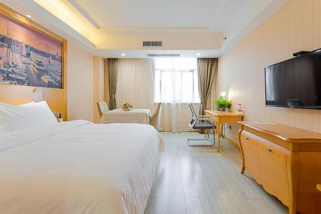 Bed in Vienna Hotel Shaanxi Ankang Jiangnan