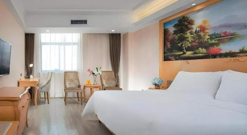 Bed in Vienna Hotel Shaanxi Ankang Jiangnan