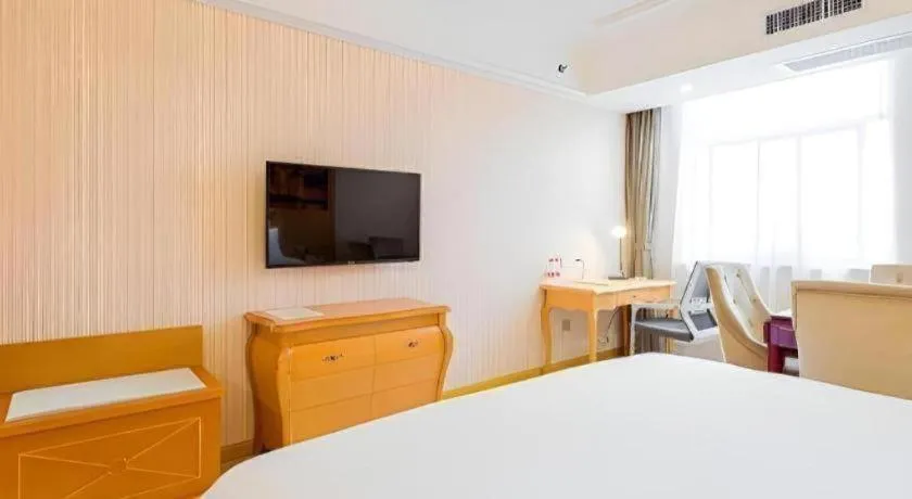 Bed in Vienna Hotel Shaanxi Ankang Jiangnan