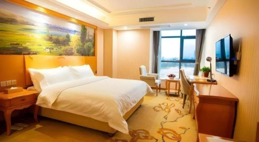 Bed in Vienna Hotel Shaanxi Ankang Jiangnan