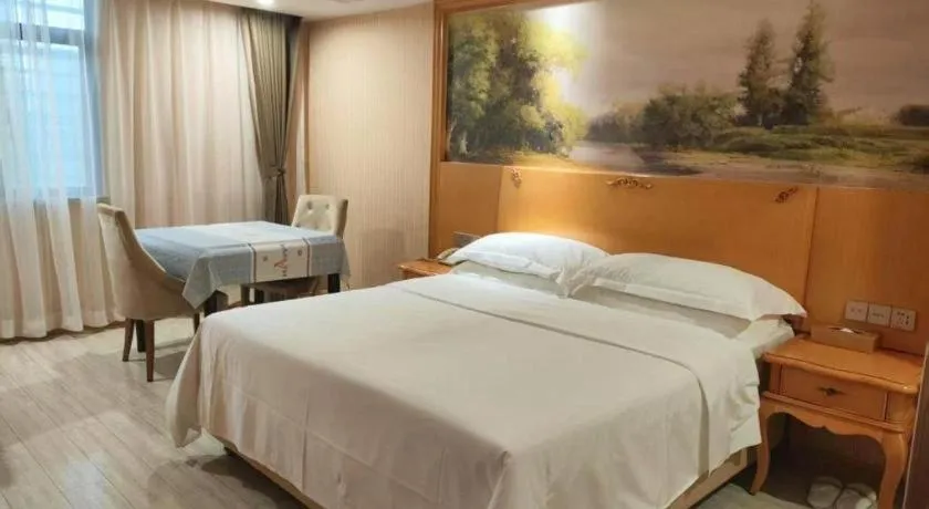 Bed in Vienna Hotel Shaanxi Ankang Jiangnan