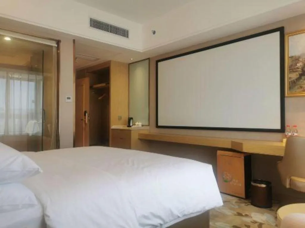 Bed in Vienna Hotel Guangdong Zhongshan South Area Passenger Station