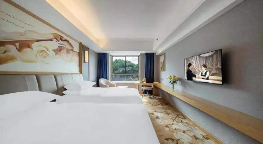 Bed in Vienna Hotel Guangdong Zhongshan South Area Passenger Station