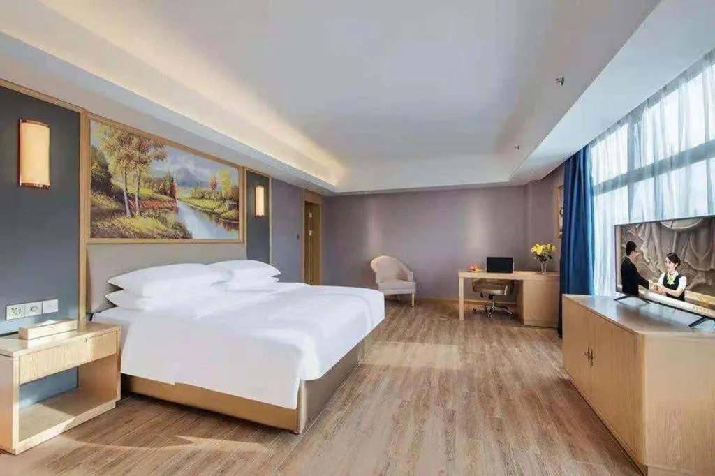 Bed in Vienna Hotel Guangdong Zhongshan South Area Passenger Station