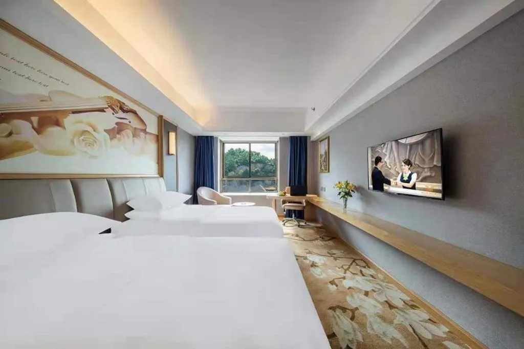 Bed in Vienna Hotel Guangdong Zhongshan South Area Passenger Station