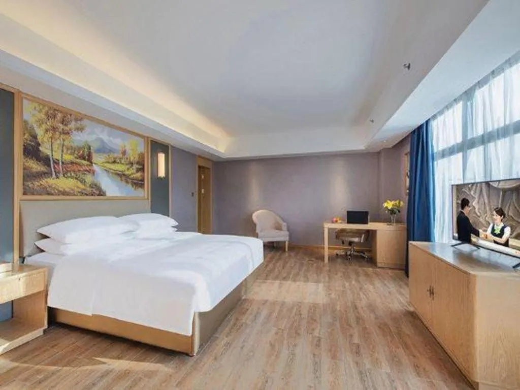 Bed in Vienna Hotel Guangdong Zhongshan South Area Passenger Station