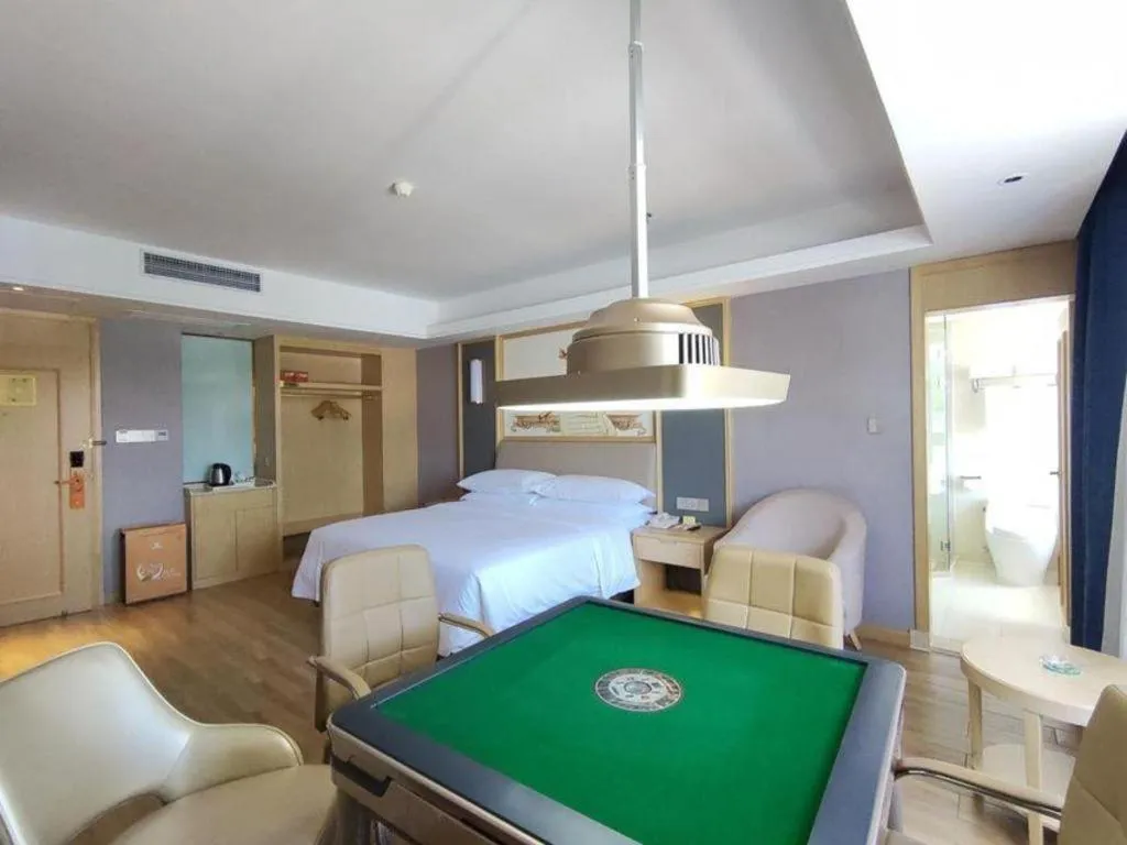 Bed in Vienna Hotel Guangdong Zhongshan South Area Passenger Station