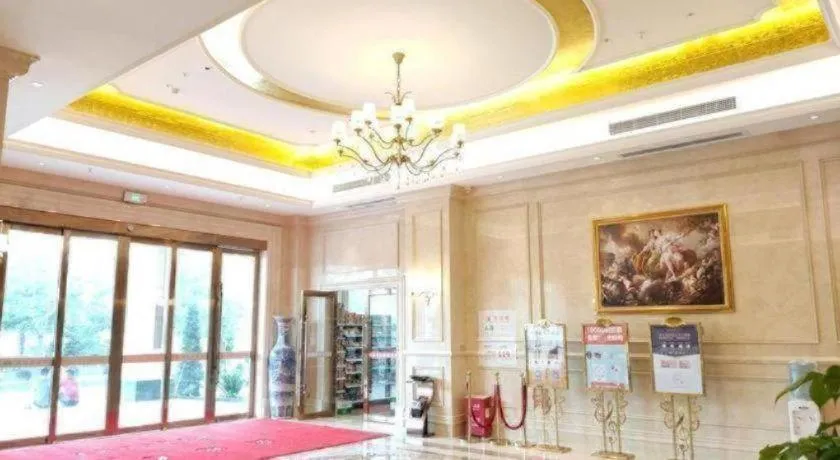 Bed in Vienna Hotel Guangdong Zhongshan South Area Passenger Station