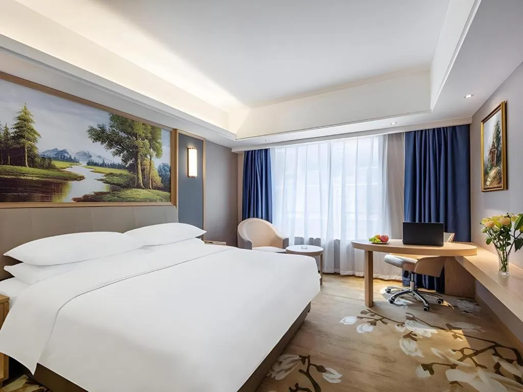 Bed in Vienna Hotel Guangdong Zhongshan South Area Passenger Station