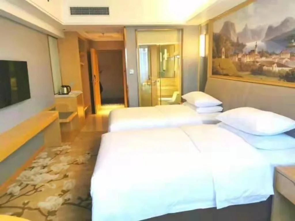 Bed in Vienna Hotel Guangdong Zhongshan South Area Passenger Station