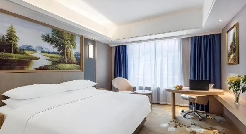 Bed in Vienna Hotel Guangdong Zhongshan South Area Passenger Station