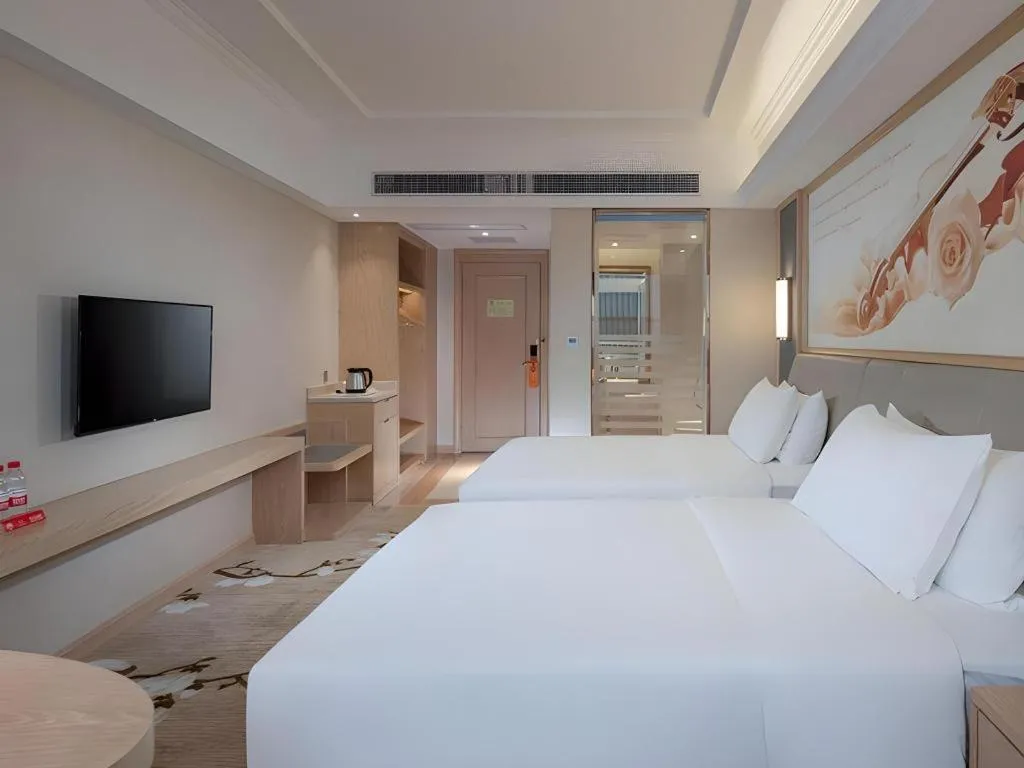 Bed in Vienna Hotel Guangdong Dongguan East Station