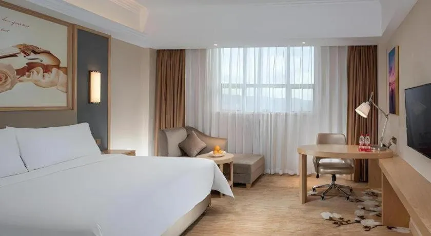 Bed in Vienna Hotel Guangdong Dongguan East Station