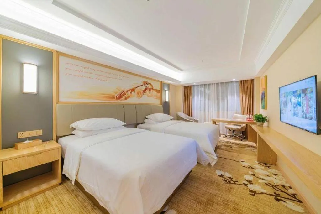 Bed in Vienna Hotel Guangdong Dongguan East Station