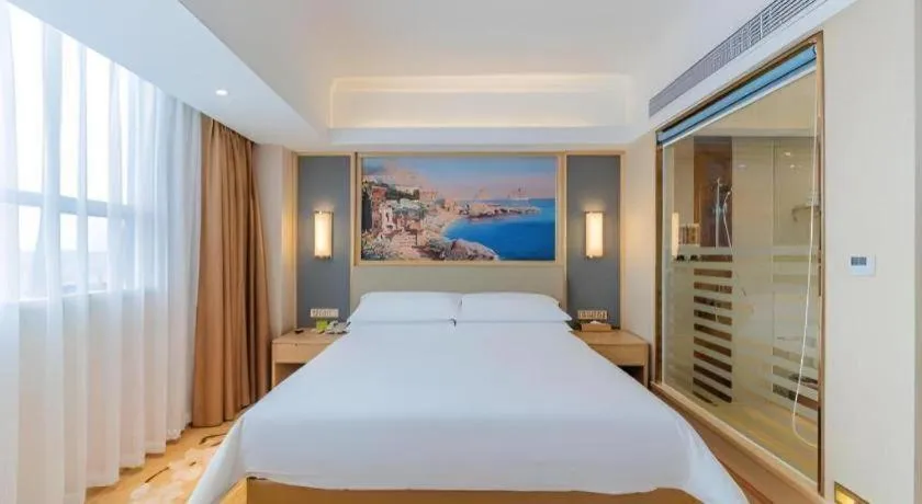 Bed in Vienna Hotel Guangdong Dongguan East Station