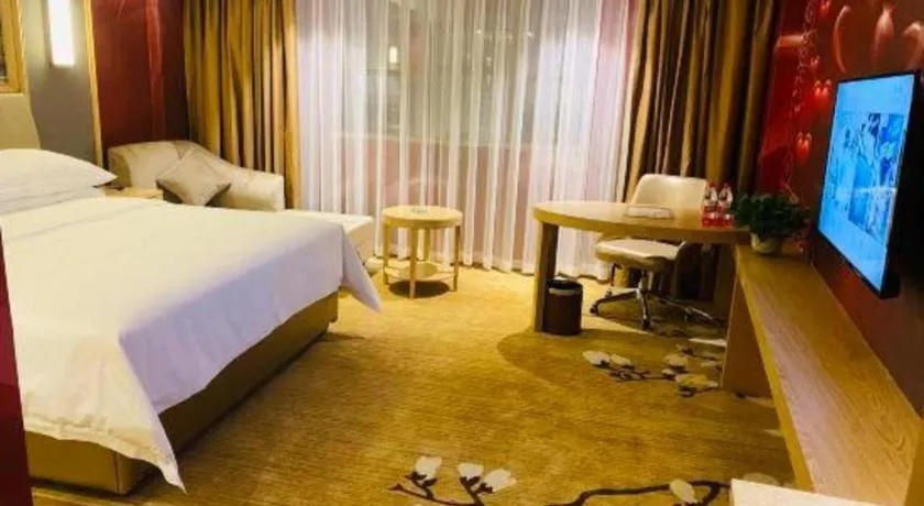 Bed in Vienna Hotel Guangdong Dongguan East Station