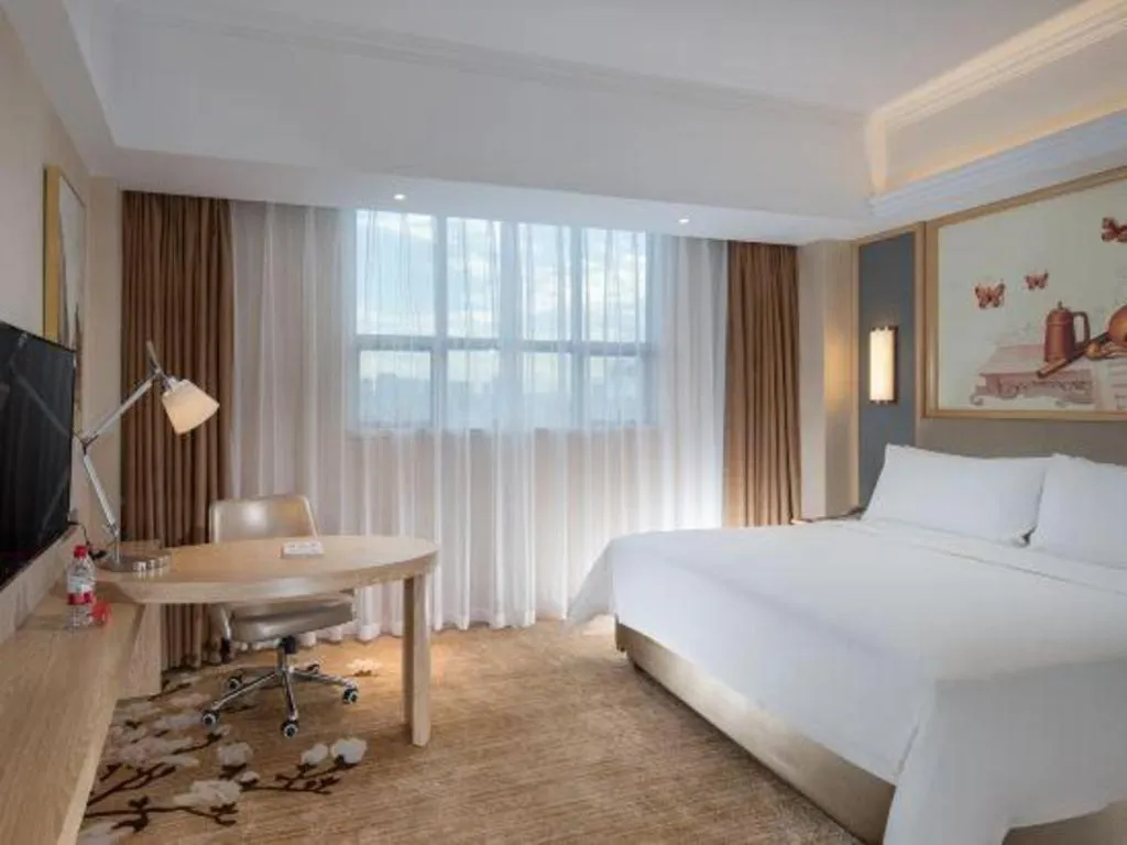 Bed in Vienna Hotel Guangdong Dongguan East Station