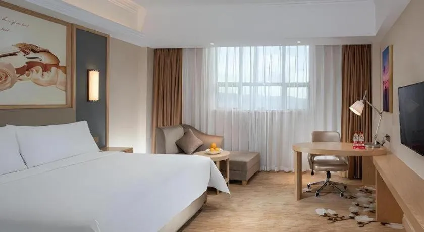 Bed in Vienna Hotel Guangdong Dongguan East Station