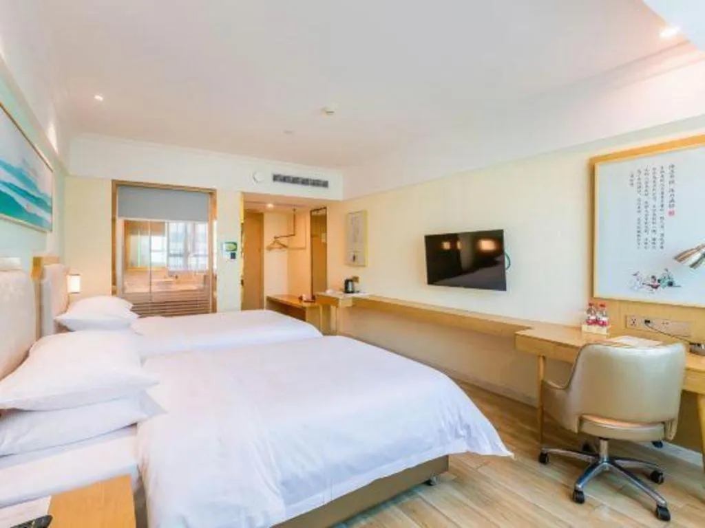 Bed in Vienna Hotel Guangdong Foshan Shunde Longjiang Material City