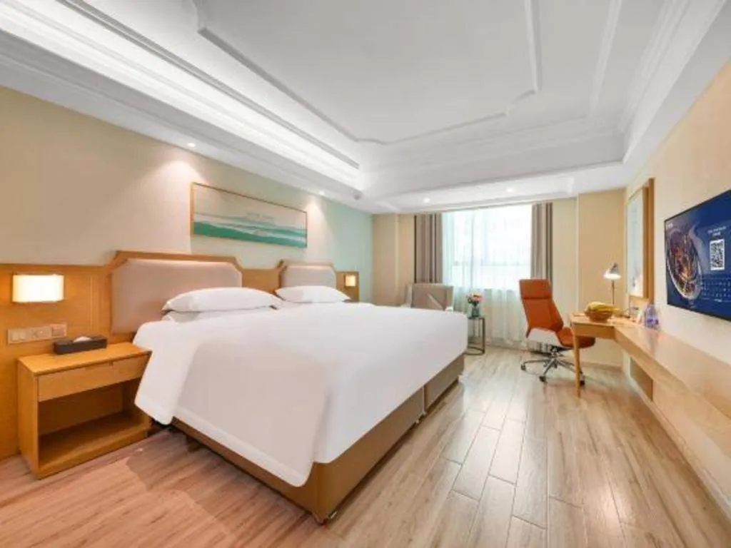 Bed in Vienna Hotel Guangdong Foshan Shunde Longjiang Material City