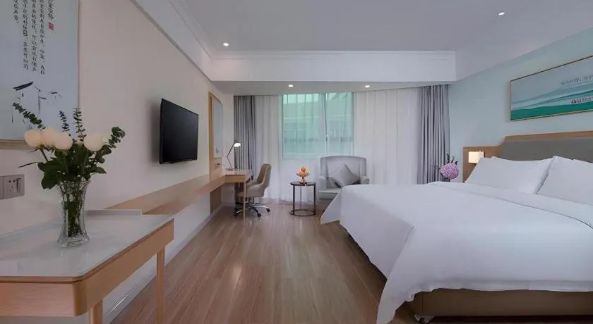 Bed in Vienna Hotel Guangdong Foshan Shunde Longjiang Material City
