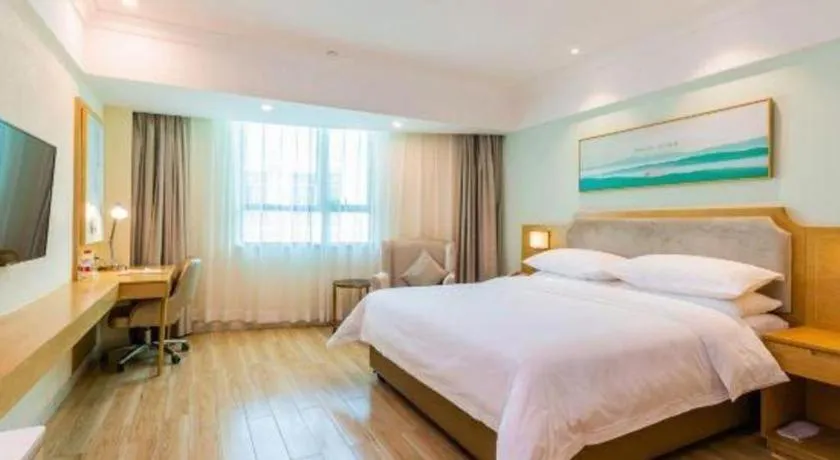 Bed in Vienna Hotel Guangdong Foshan Shunde Longjiang Material City