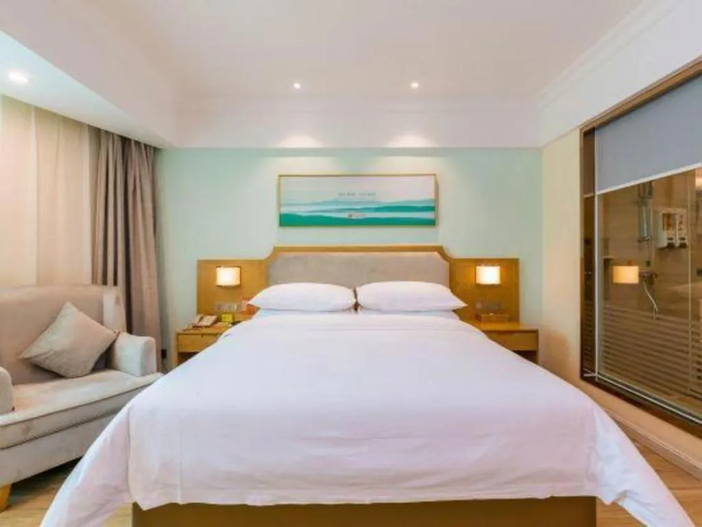 Bed in Vienna Hotel Guangdong Foshan Shunde Longjiang Material City