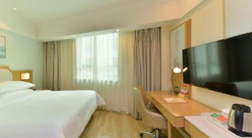 Bed in Vienna Hotel Guangdong Foshan Shunde Longjiang Material City