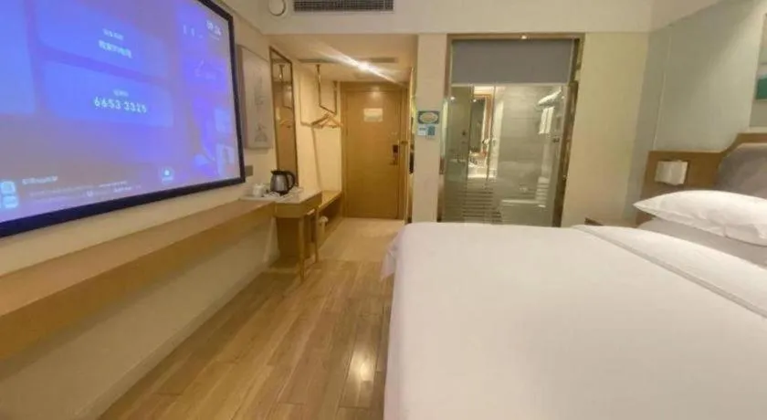 Bed in Vienna Hotel Guangdong Foshan Shunde Longjiang Material City