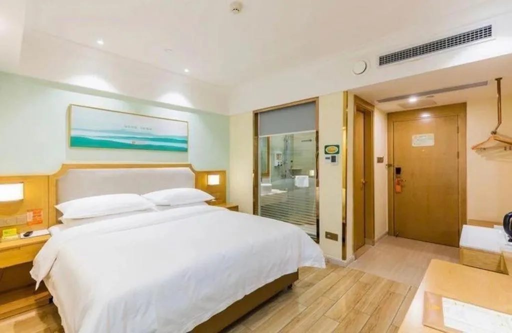 Bed in Vienna Hotel Guangdong Foshan Shunde Longjiang Material City