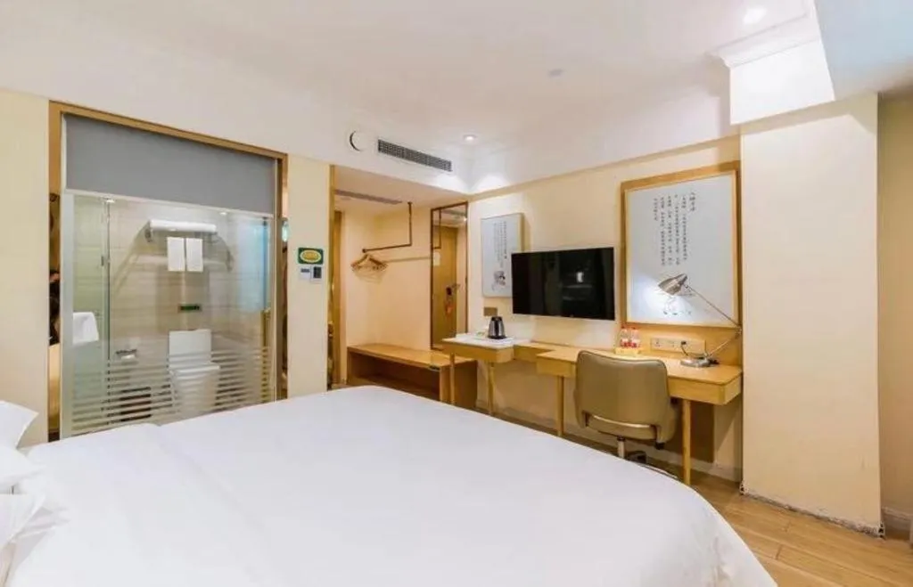 Bed in Vienna Hotel Guangdong Foshan Shunde Longjiang Material City