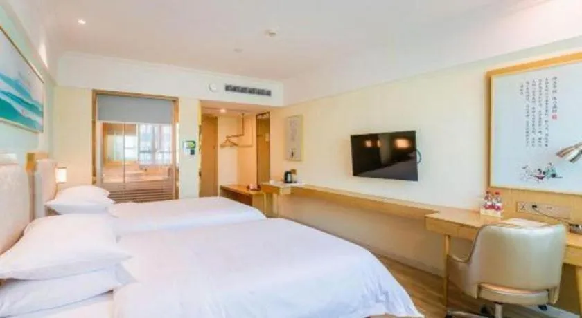 Bed in Vienna Hotel Guangdong Foshan Shunde Longjiang Material City