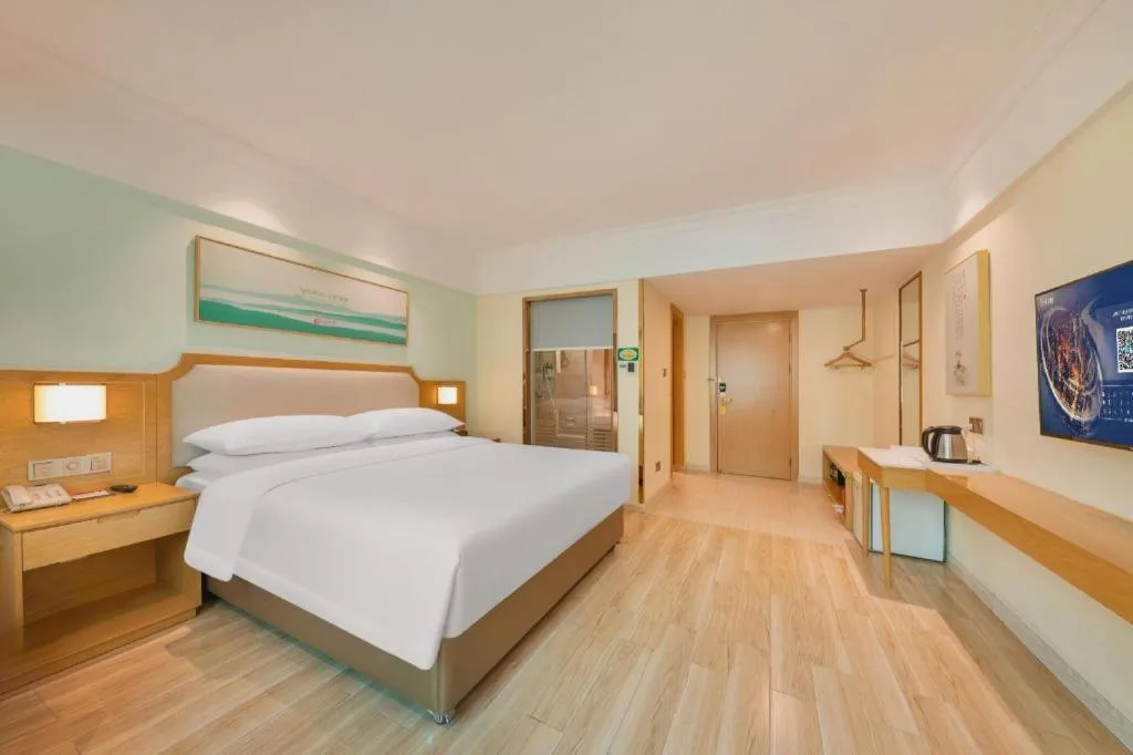 Bed in Vienna Hotel Guangdong Foshan Shunde Longjiang Material City