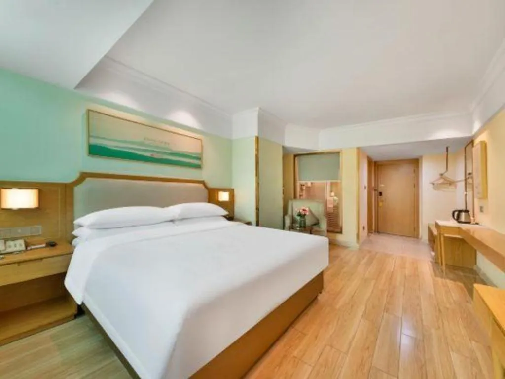 Bed in Vienna Hotel Guangdong Foshan Shunde Longjiang Material City