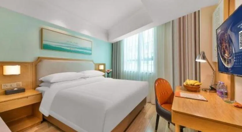 Bed in Vienna Hotel Guangdong Foshan Shunde Longjiang Material City
