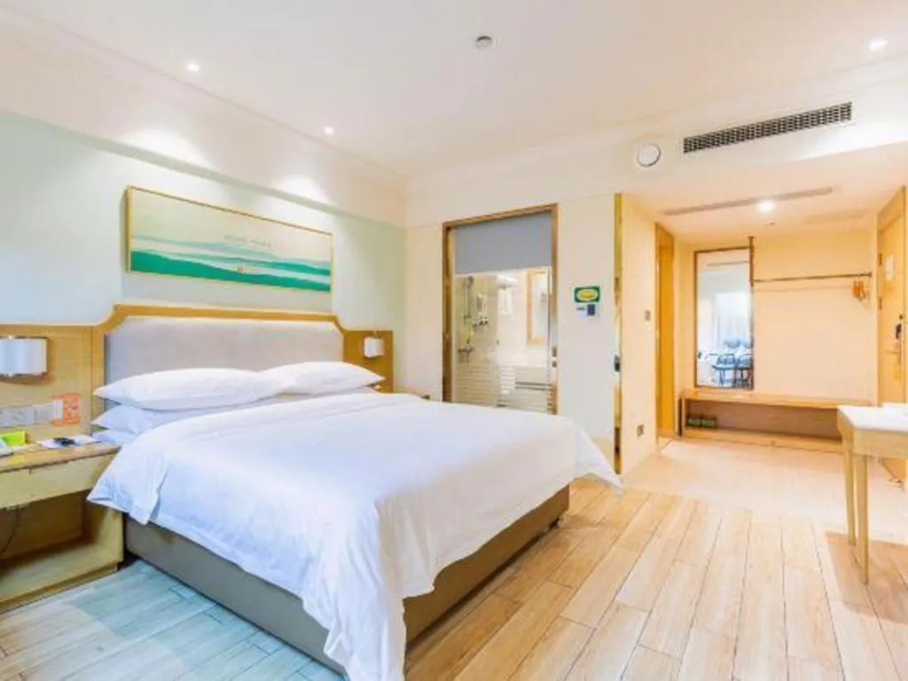 Bed in Vienna Hotel Guangdong Foshan Shunde Longjiang Material City