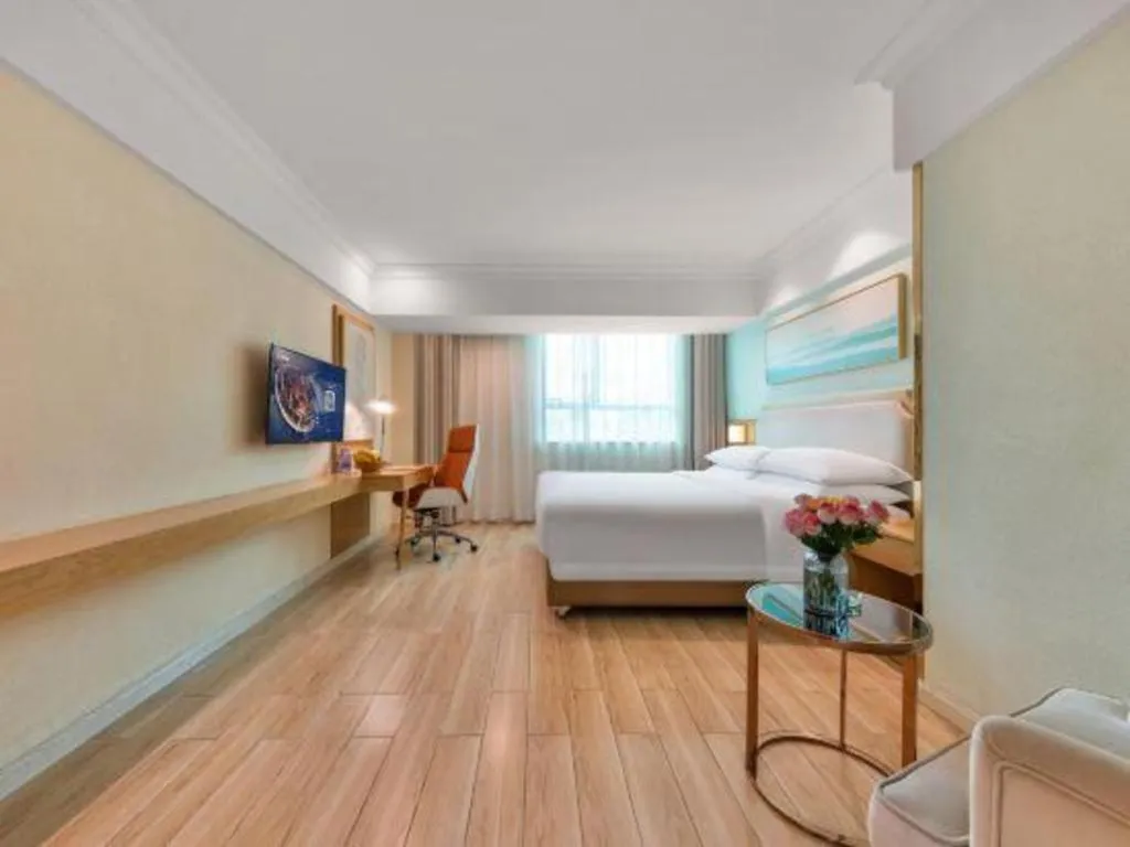 Bed in Vienna Hotel Guangdong Foshan Shunde Longjiang Material City