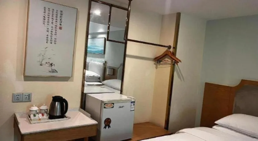 Bed in Vienna Hotel Guangdong Foshan Shunde Longjiang Material City