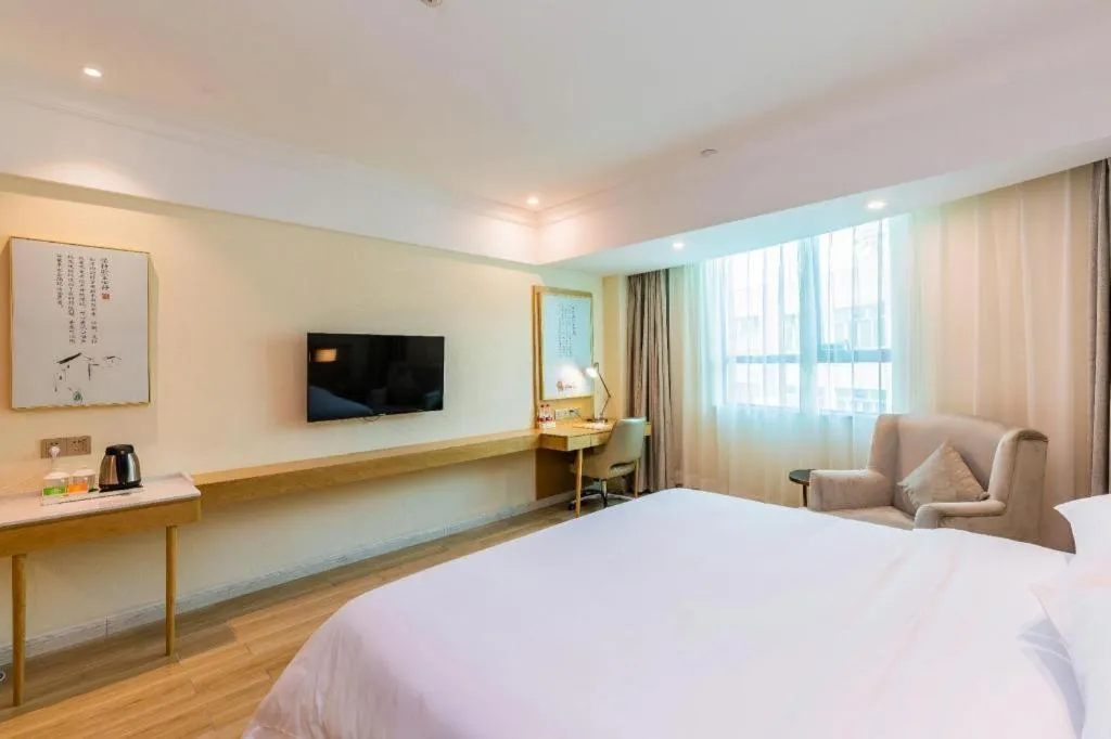 Bed in Vienna Hotel Guangdong Foshan Shunde Longjiang Material City