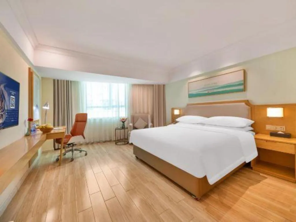 Bed in Vienna Hotel Guangdong Foshan Shunde Longjiang Material City