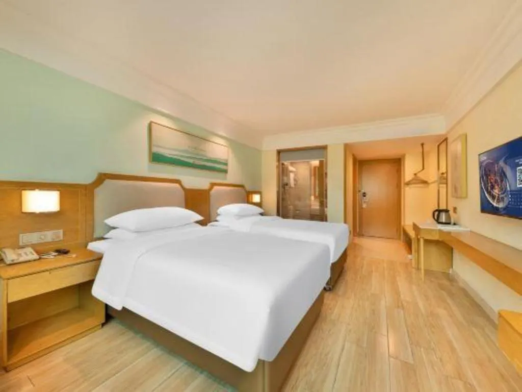 Bed in Vienna Hotel Guangdong Foshan Shunde Longjiang Material City