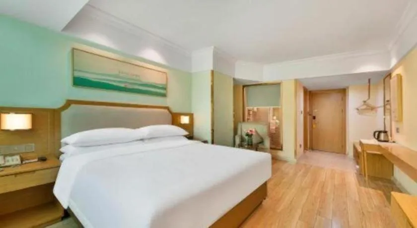 Bed in Vienna Hotel Guangdong Foshan Shunde Longjiang Material City