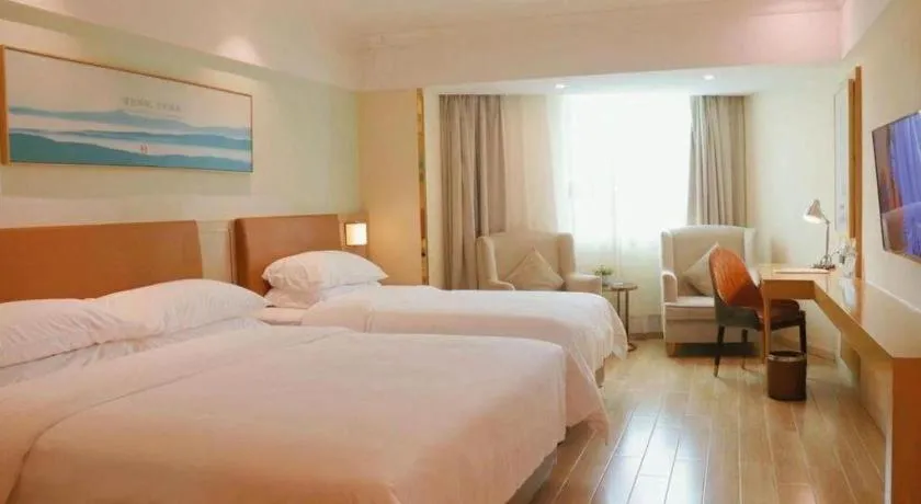 Bed in Vienna Hotel Guangdong Foshan Shunde Longjiang Material City