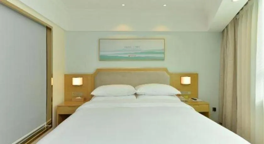 Bed in Vienna Hotel Guangdong Foshan Shunde Longjiang Material City