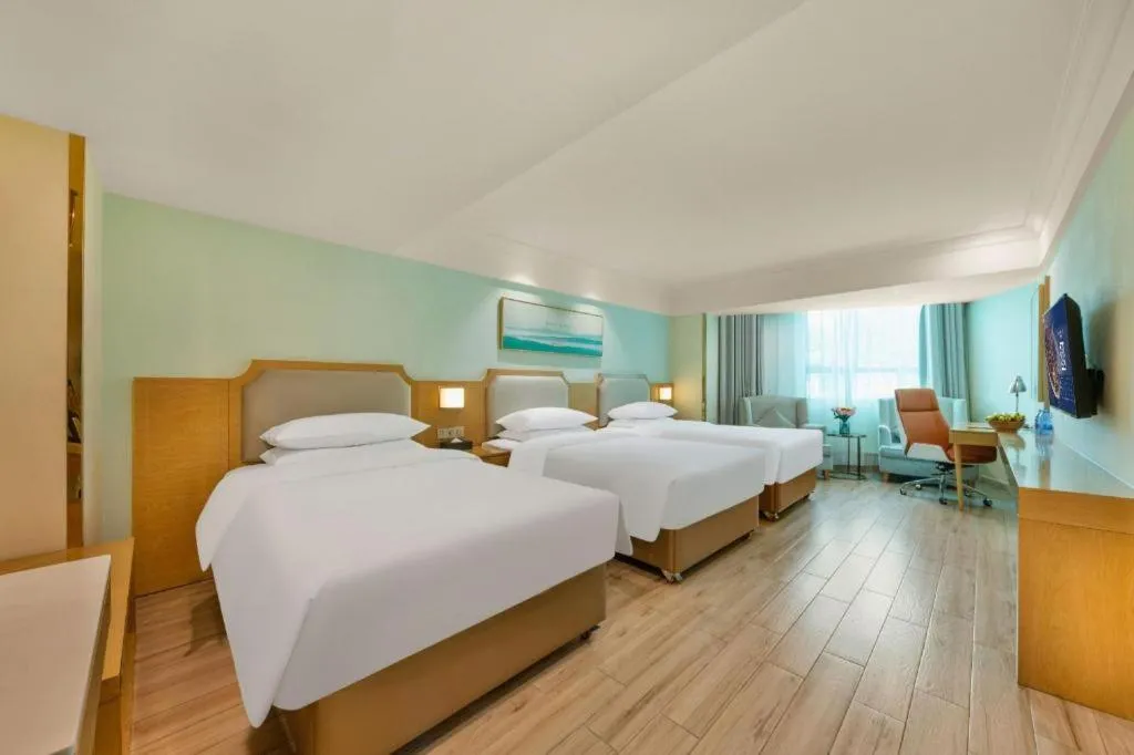 Bed in Vienna Hotel Guangdong Foshan Shunde Longjiang Material City