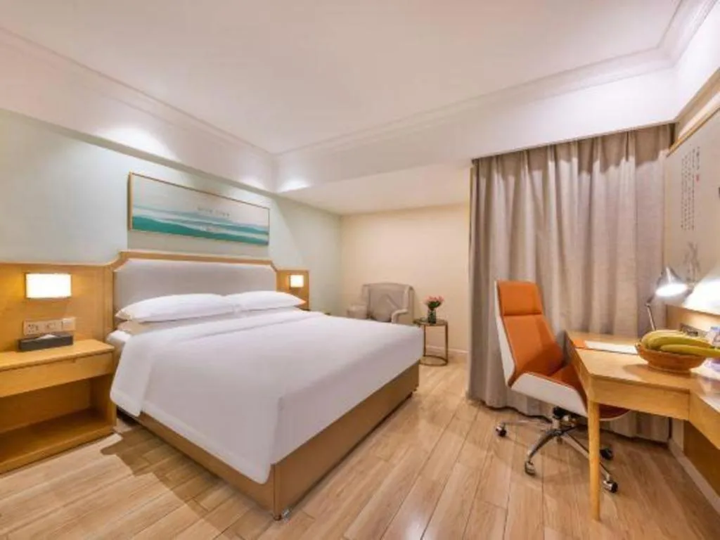 Bed in Vienna Hotel Guangdong Foshan Shunde Longjiang Material City