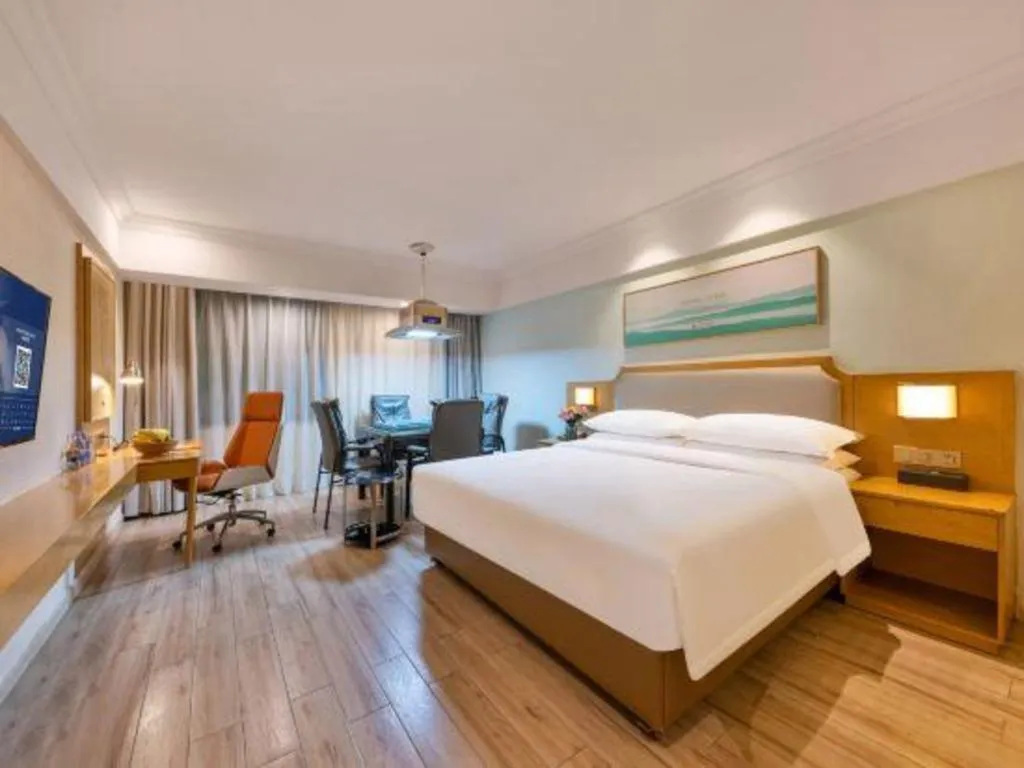 Bed in Vienna Hotel Guangdong Foshan Shunde Longjiang Material City