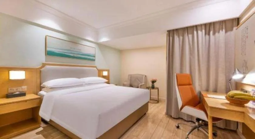 Bed in Vienna Hotel Guangdong Foshan Shunde Longjiang Material City