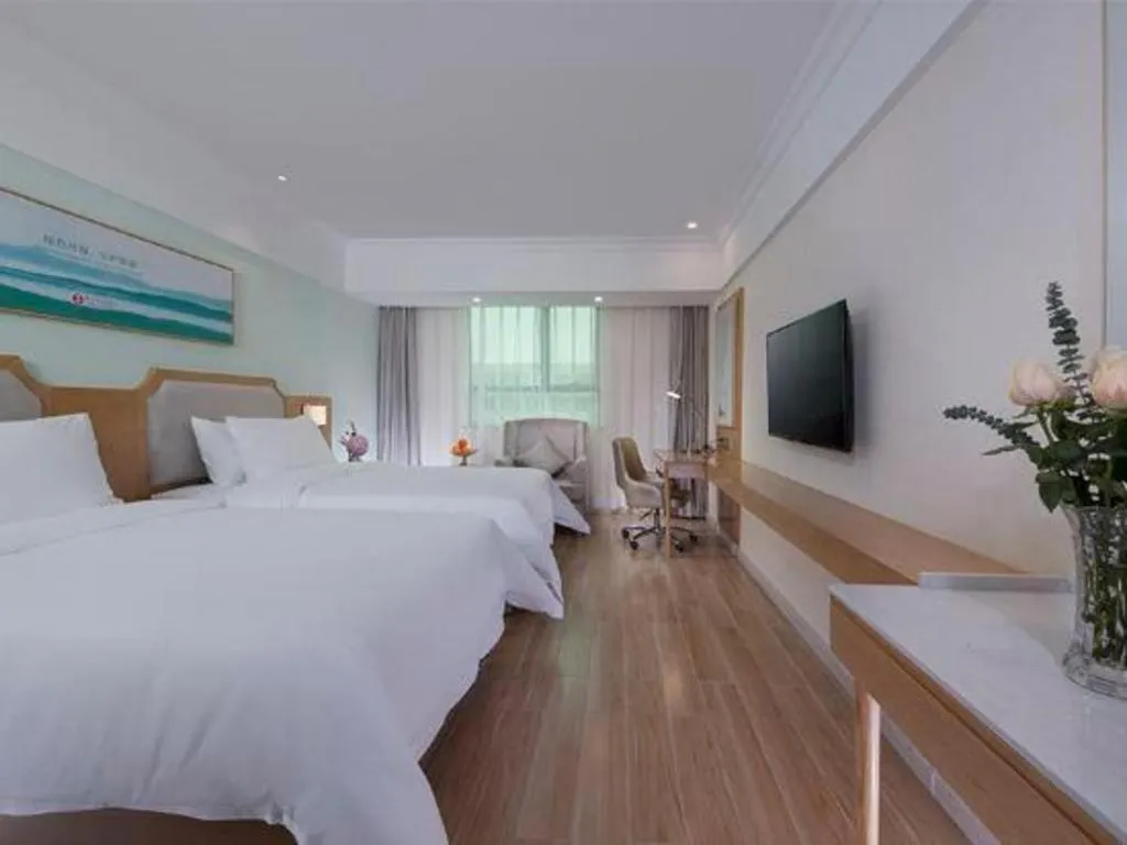 Bed in Vienna Hotel Guangdong Foshan Shunde Longjiang Material City