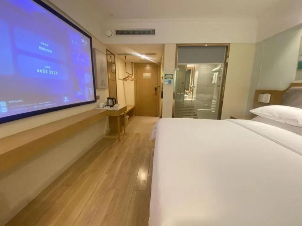 Bed in Vienna Hotel Guangdong Foshan Shunde Longjiang Material City